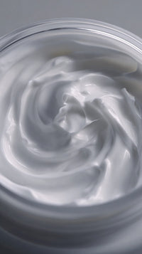 A Jar Of White Cream With A Swirled Texture Placed Against A Neutral Background — Stock Photo