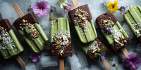 Green Matcha Ice Pops With Nuts And Seeds Arranged In A Row On A Tray Ready To Be Enjoyed — Stock Photo