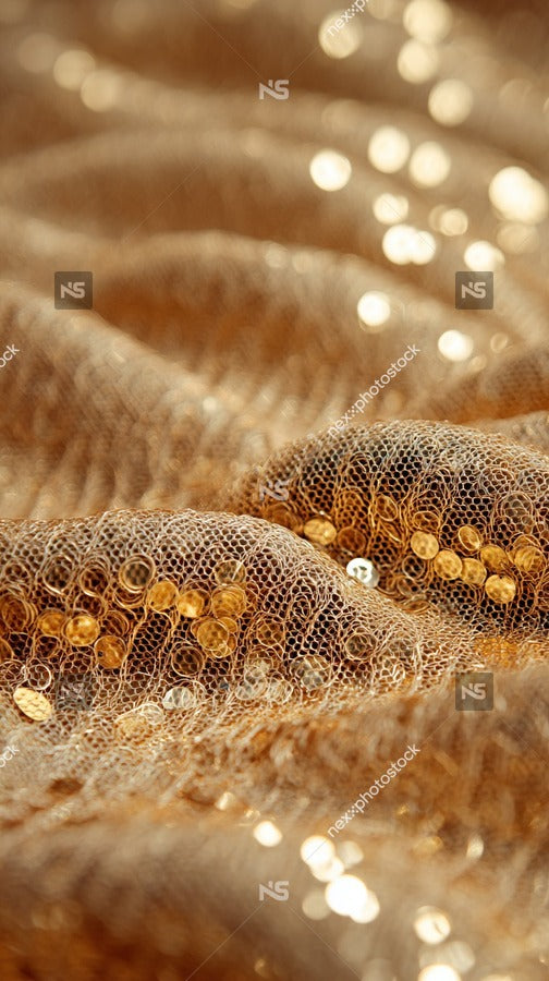 Close Up Of Glittering Gold Fabric Texture With Visible Sequins And Beads Set Against A Blurred Background — Stock Photo