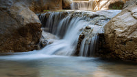 Waterfall Cascading Through Rocky Canyon — Stock Photo