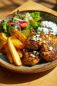 A Plate Of Greek Meatballs With Tzatziki Sauce And French Fries On A Wooden Table — Stock Photo