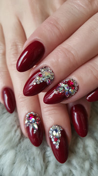 Red And Silver Nail Art With Diamond Accents — Stock Photo