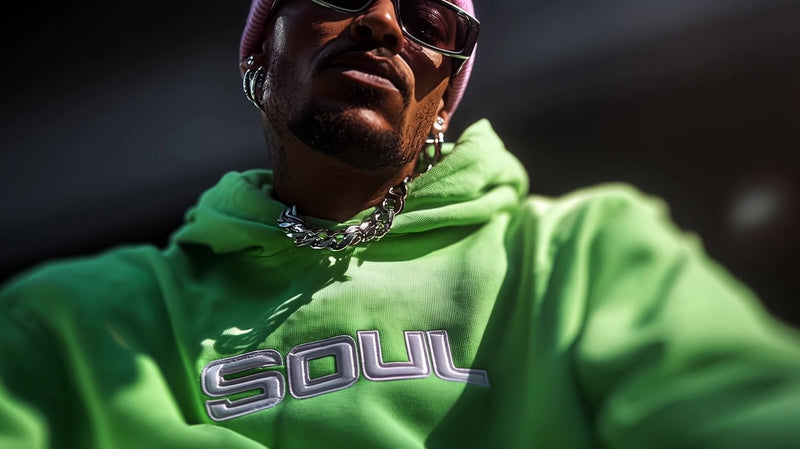 shows a man wearing sunglasses a colorful hoodie with the word soul on it and pink hair - Stock Video