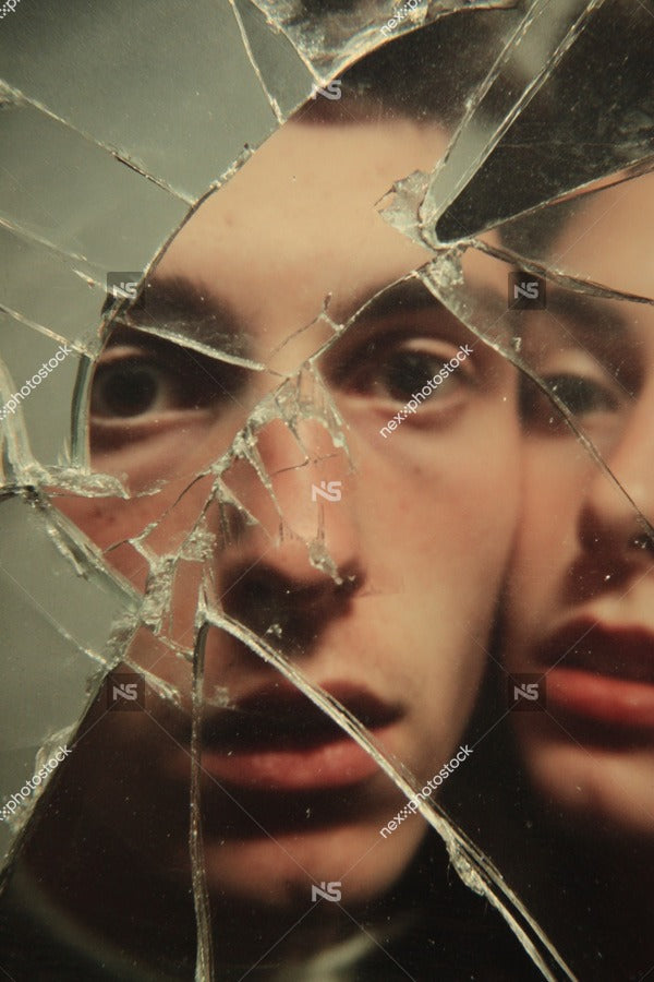 A Shattered Mirror Captures A Man S Face With His Reflection Visible Through The Broken Glass — Stock Photo