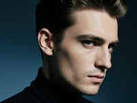 A Portrait Of An Actor Captured In A Close Up Shot Against A Blue Background — Stock Photo