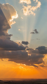 sunbeams piercing clouds - Stock Video