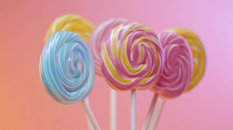 colorful lollipops on sticks - Stock Video