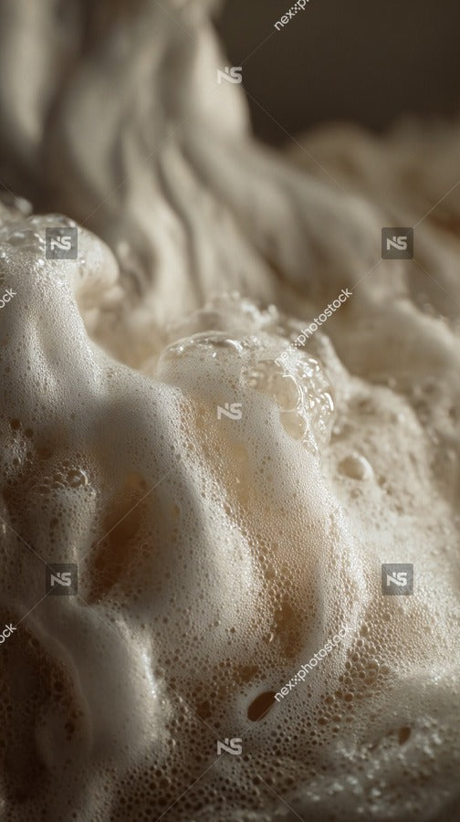Displays A Close Up View Of A Frothy Substance That Resembles Foam Batter With Visible Air Bubbles And A Creamy Texture — Stock Photo