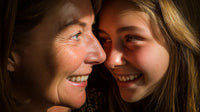 A Woman And Child Share A Close Moment With The Woman Looking Down At The Child With A Smile On Her Face — Stock Photo