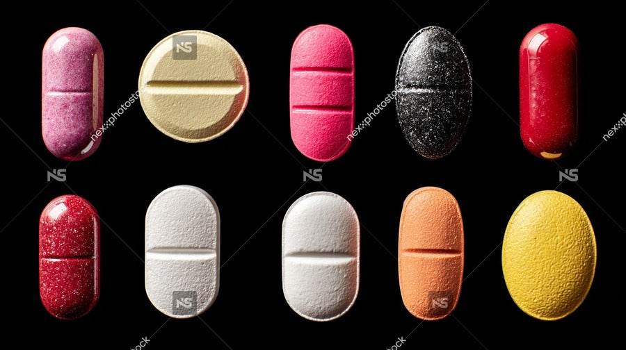 A Collection Of Multicolored Pills Showcasing A Diverse Range Of Colors And Shapes Displayed In An Organized Manner Against A Dark Background — Stock Photo