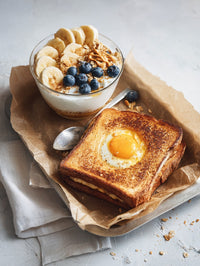 A Plate Of French Toast Topped With A Fried Egg And Blueberries Served On A Wooden Table — Stock Photo