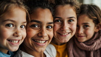 A Family Portrait Of Four Children And One Adult Smiling And Posing For A Photo With A Blurred Background — Stock Photo