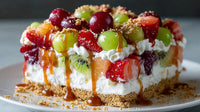 A Fruit Tart With Whipped Cream Topped With A Drizzle Of Caramel Sauce And Garnished With Fresh Berries — Stock Photo