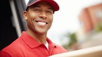 A Portrait Of A Man Wearing A Red Uniform Which Includes A Cap And A Polo Shirt — Stock Photo